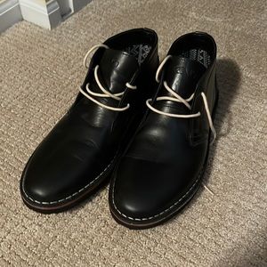 Mens brand new black leather dress shoe.